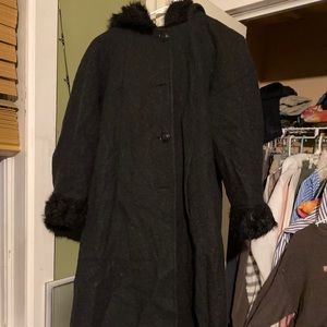 Full length wool coat trimmed in faux fur.